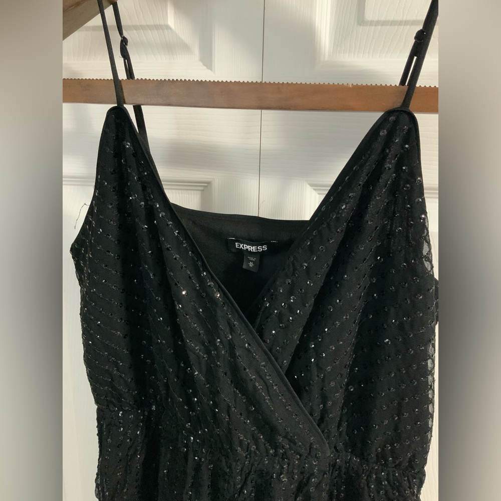 One piece sequin black jumper.